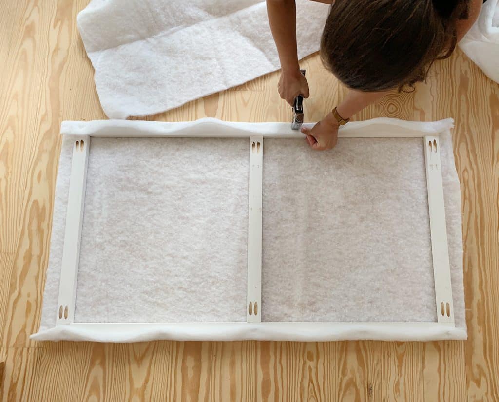 headboard-diy-sherry-stapling-first-batting-layer-1024x825-1 Sherry stapling fabric batting around wood frame for DIY upholstered headboard