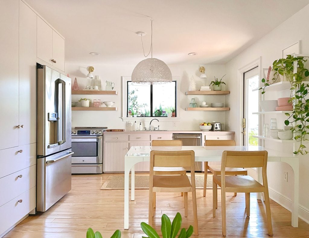 holiday-house-kitchen-hero-with-door-horizontal-1024x788-3 Small Kitchen With White And Mauve Cabinets With Plants
