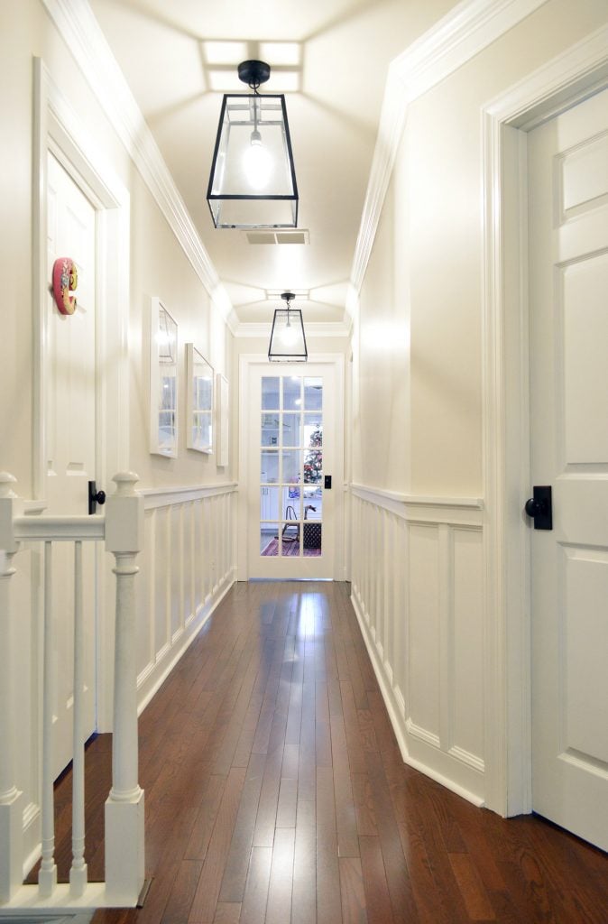 house-tour-hallway-to-bonus-high-res-674x1024-1 Long Traditional Hallway With DIY Wainscoting