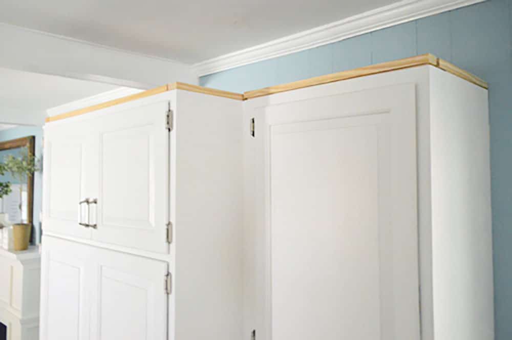 kitchen-crown-scrap-nailed-along-top Scrap wood nailed along perimeter of upper cabinet in kitchen