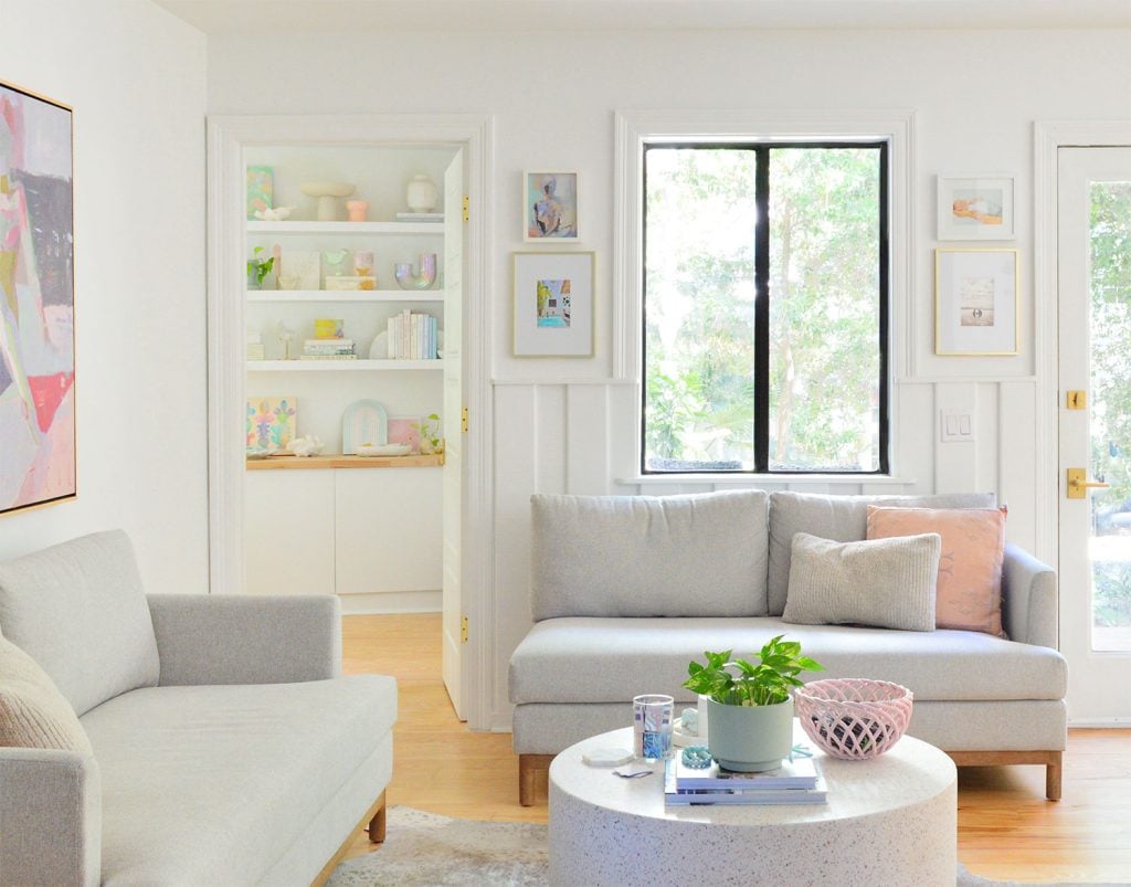 kitchen-sitting-area-door-into-bedroom-1024x803-2 Sitting Area With Loveseats And Doorway Intro Bedroom With Colorful Shelves