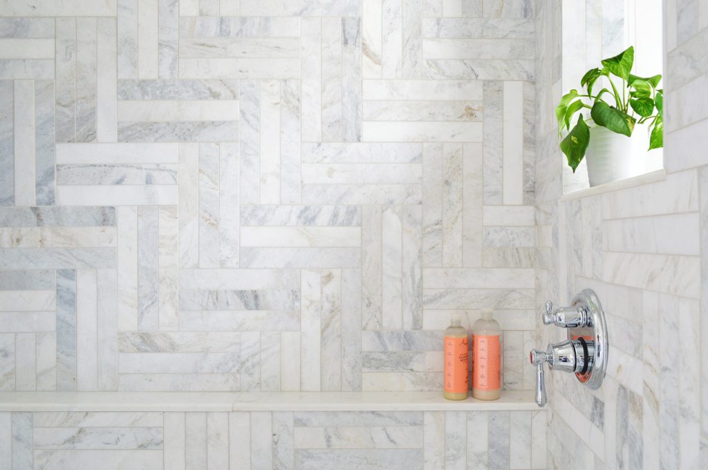 marble-master-bathroom-shower-tile-detail-horizontal-1024x681-1 Detail of Herringbone Marble Tile Shower With Shampoo Ledge