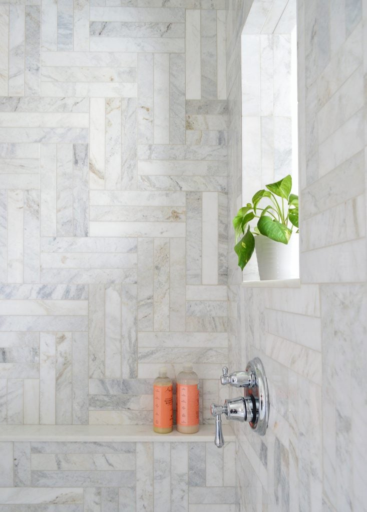 marble-master-bathroom-shower-tile-detail-vertical-733x1024-1 Detail Of Marble Bathroom With Intricate Herringbone Pattern