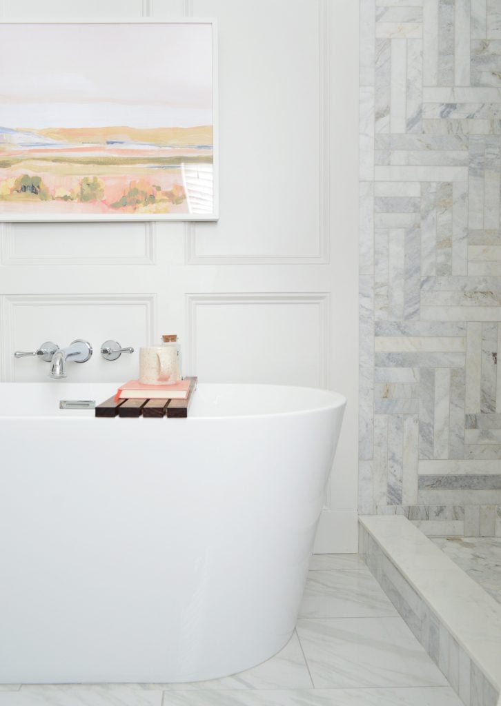 marble-master-bathroom-tub-side-view-with-art-726x1024-1 Freestanding tub side view in modern bathroom with marble shower
