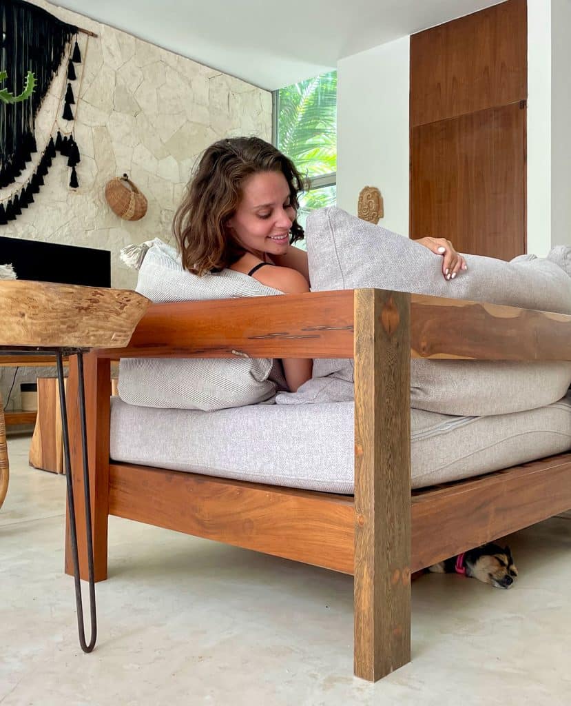mexico-with-kids-airbnb-penny-under-couch-829x1024-1 Penny The Chorkie Sleeping Under Couch In Tulum Mexico Airbnb