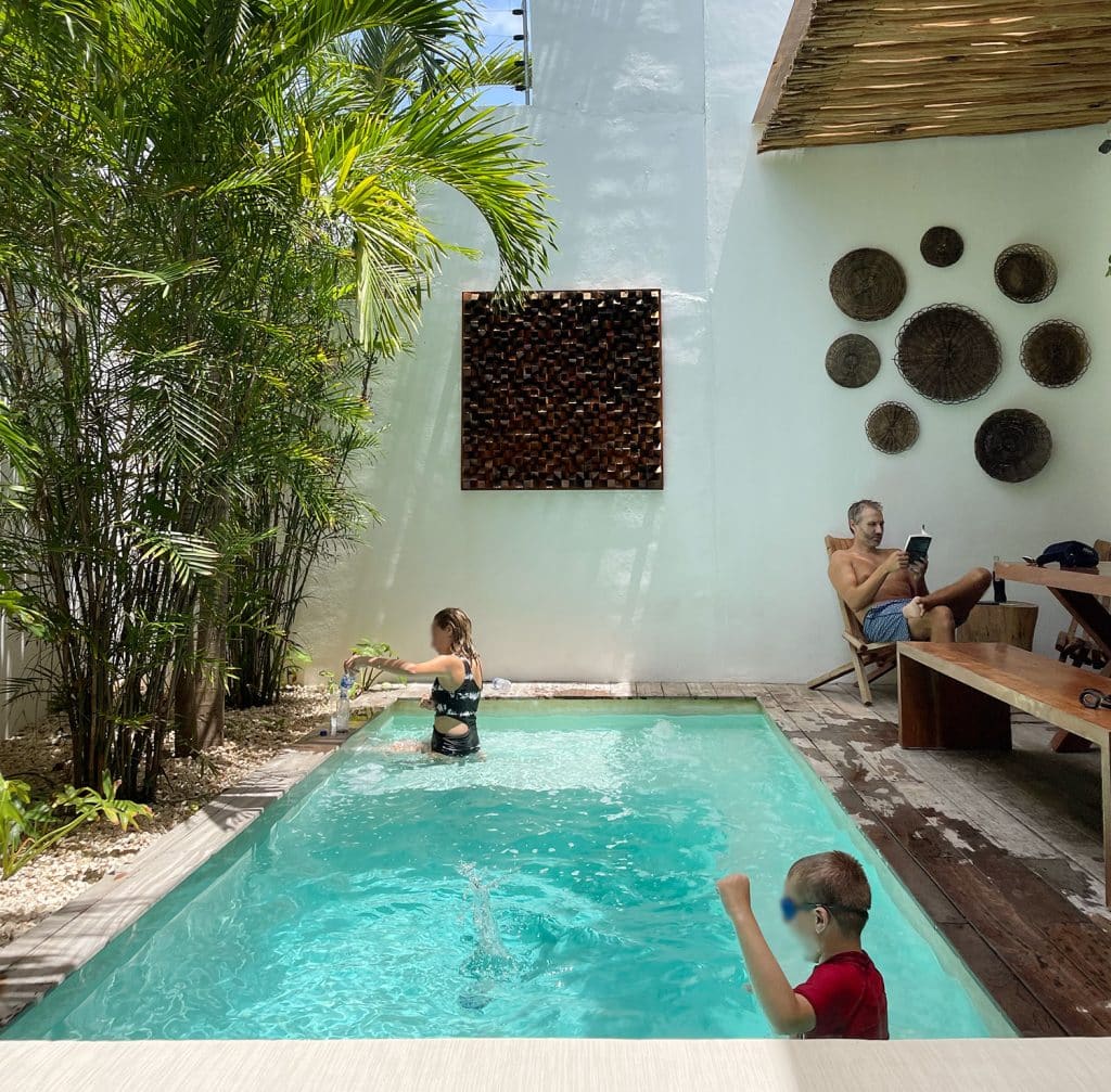 mexico-with-kids-all-playing-in-pool-1024x1007-1 Kids Playing John Reading At Airbnb Pool In Tulum Mexico