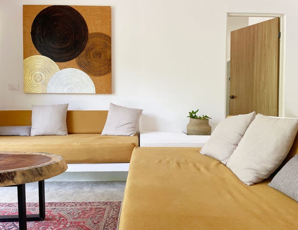mexico-with-kids-arkah-airbnb-yellow-sofas-1024x791-1 Akumal Airbnb in Mexico With Yellow Lounge Sofas