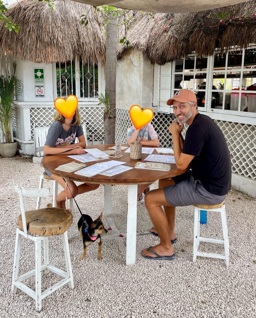 mexico-with-kids-outdoor-dining-with-dog-825x1024-1 Dining Outdoors in Tulum Mexico With Dog Under Table