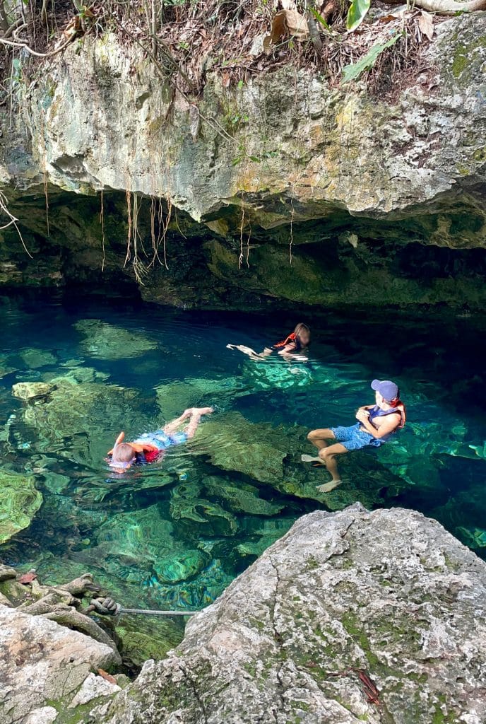 mexico-with-kids-snorkeling-in-akumal-cenote-688x1024-1 Kids Swimming in Cenote In Yucatan Mexico