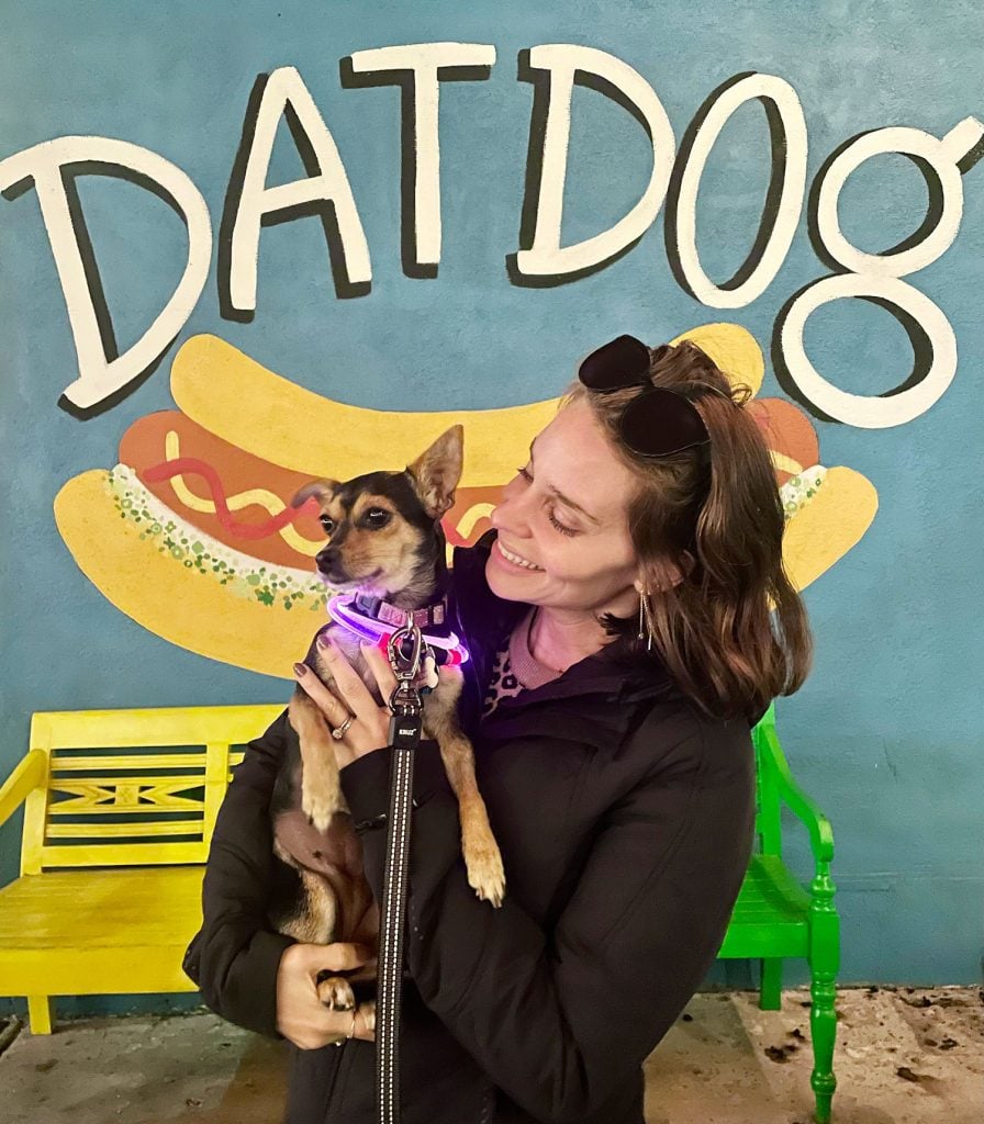 new-orleans-dat-dog-sign-with-chihuahua-896x1024-1 Sherry Holding Chihuahua In Front Of Dat Dog Mural New Orleans