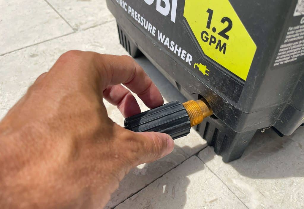 pressure-washing-101-attach-pressure-hose-1024x705-1 Screwing high pressure hose to side of Ryobi Electric Pressure Washer