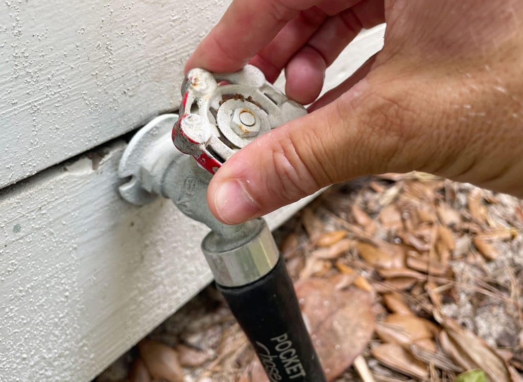 pressure-washing-101-turn-on-hose-1024x748-1 Turning on water at outdoor hose bib for pressure washing