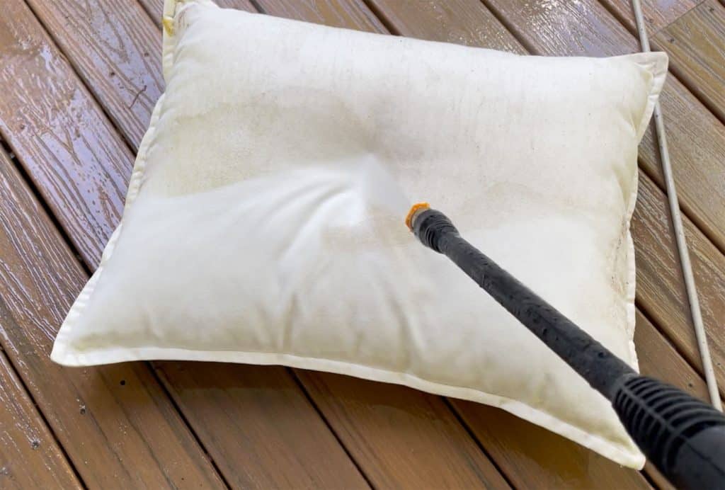 pressure-washing-101-washing-pillow-1024x692-1 Spraying Outdoor Pillow With Electric Pressure Washer