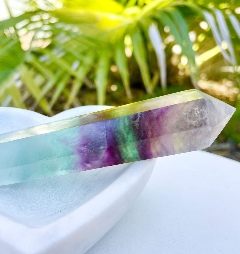rainbow-fluorite-crystal-in-stone-dish-967x1024-1 Rainbow Fluorite Crystal In Stone Dish With Plan In Background