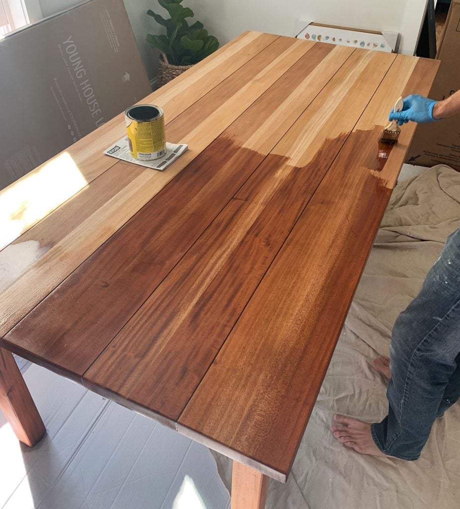 refinishing-duplex-dining-table-staining-cb-table-925x1024-1 Minwax Stain Being Applied To Wood Dining Table During Refinishing