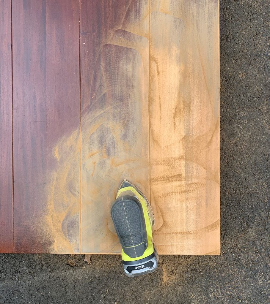 sanding-dining-tables-peek-at-crate-barrel-table-908x1024-1 Sanding the finish off of a wood dining table to refinish it with new stain