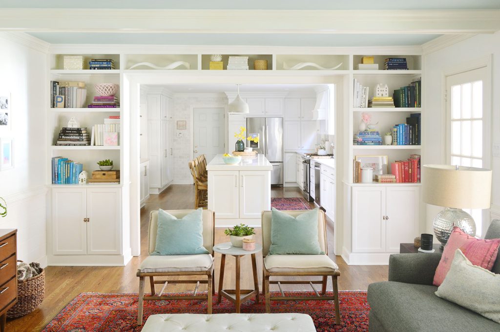 simply-white-built-in-bookshelves-around-doorway-1024x681-1 Built-In Bookshelf Around Doorway Painted Benjamin Moore Simply White