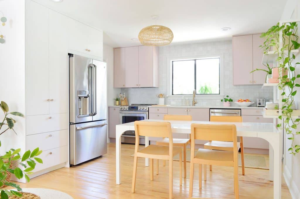 small-kitchen-angle-from-bedroom-1024x681-1 Side View Of Ikea Kitchen With White And Mauve Cabinets And Long Table
