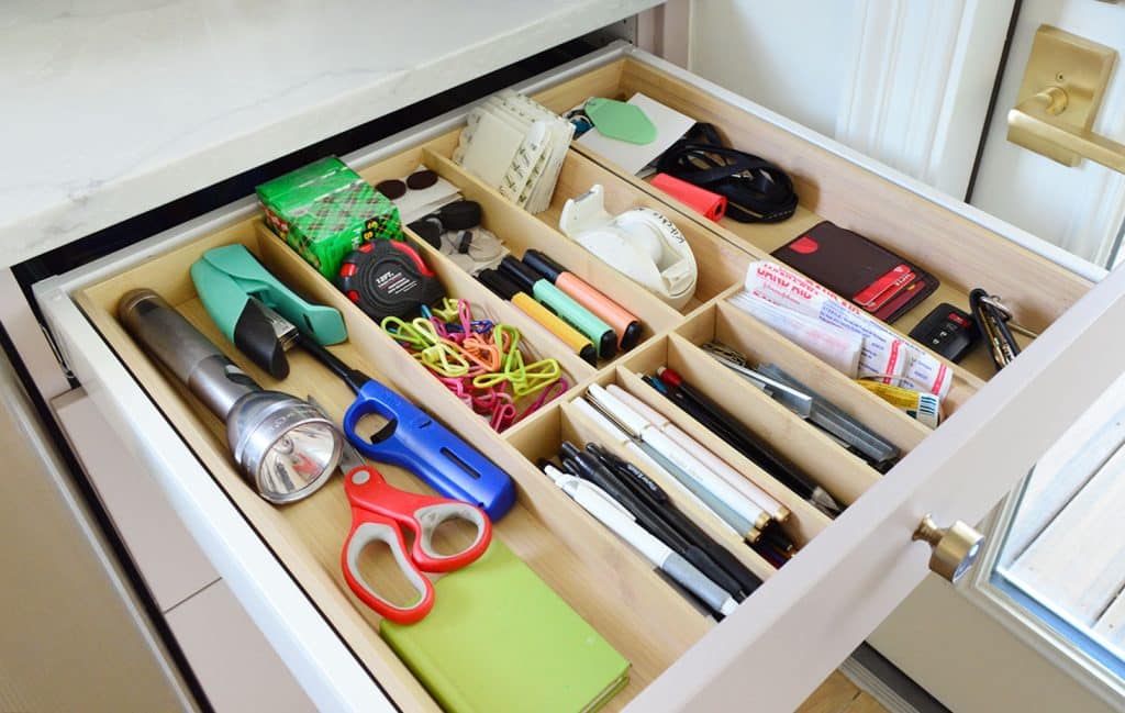 small-kitchen-organization-junk-drawer-detail-1024x649-1 Close Up Of Junk Drawer With Wood Dividers In Ikea Kitchen