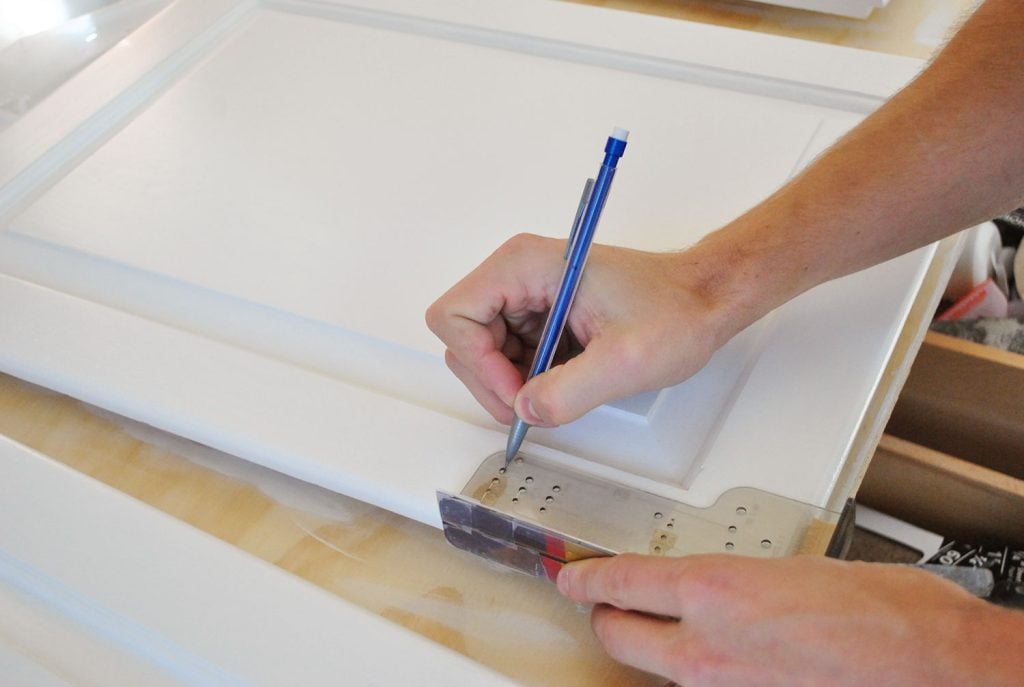 step-8-marking-holes-for-new-hardware-1024x687-1 Marking Holes For Cabinet Hardware With Template