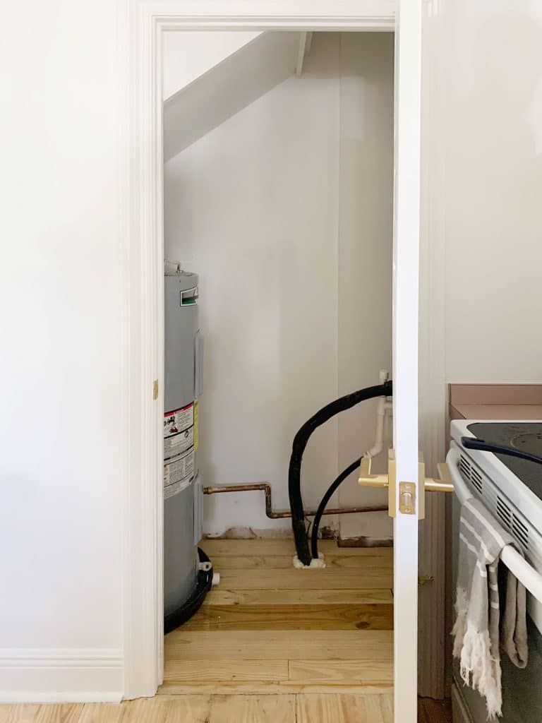 utility-closet-before-full-768x1024-1 Before Photo Of Utility Closet With Large Water Heater Tank