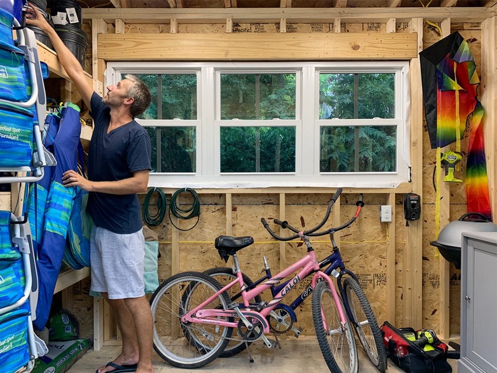beach-shed-john-inside-1024x769-1 John reaching for something in beach house shed
