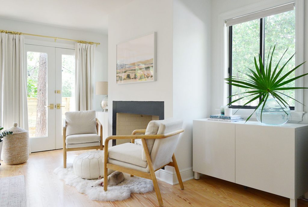 besta-cabinets-bedroom-angle-1024x689-1 White Ikea Besta Cabinet Under Window In Bedroom Behind Chair
