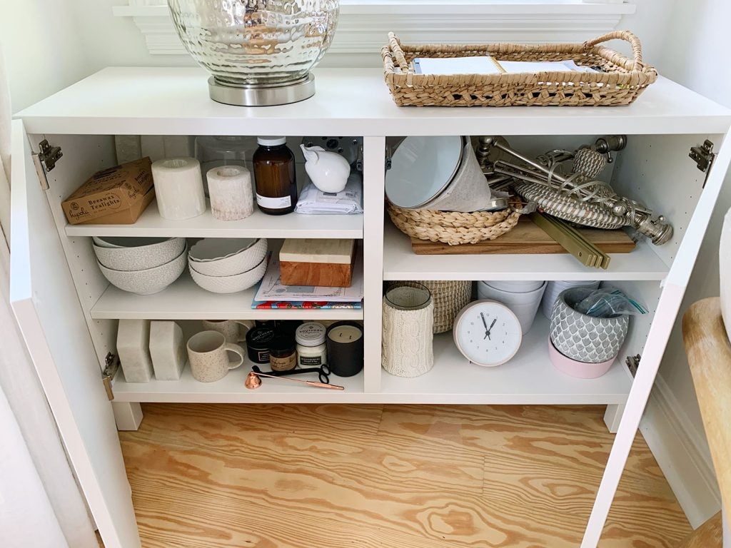 besta-cabinets-bedroom-left-cabinet-opened-1024x768-1 Besta Cabinet Opened With Various Decor Accessories On Shelves