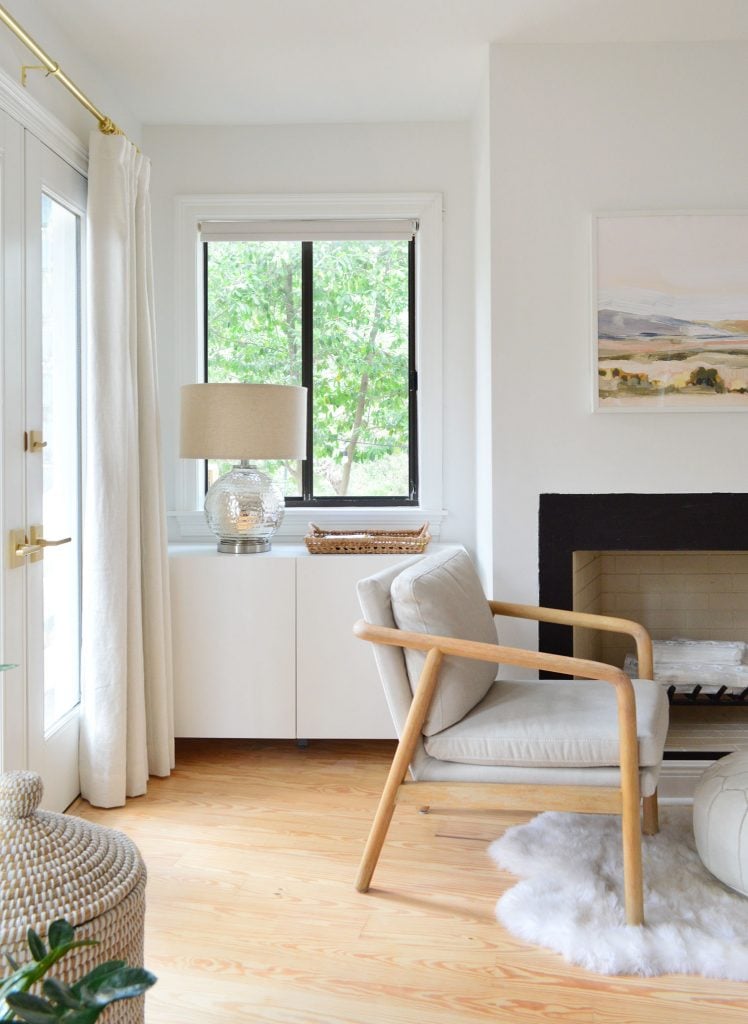 besta-cabinets-bedroom-vertical-door-748x1024-1 Ikea Besta Cabinet Under Window In Bedroom With Lamp On It