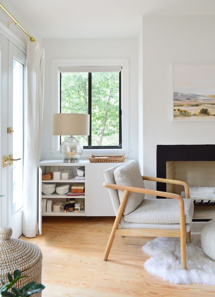 besta-cabinets-bedroom-vertical-door-open-741x1024-2 Besta Cabinet In Bedroom With Door Open Showing Decor Storage