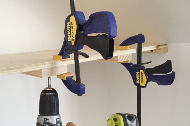 bonusbuilts-uppers-clampedtop Screwing on a top plywood piece for thin floating shelves using Irwin Quick Grip clamps to hold the in place
