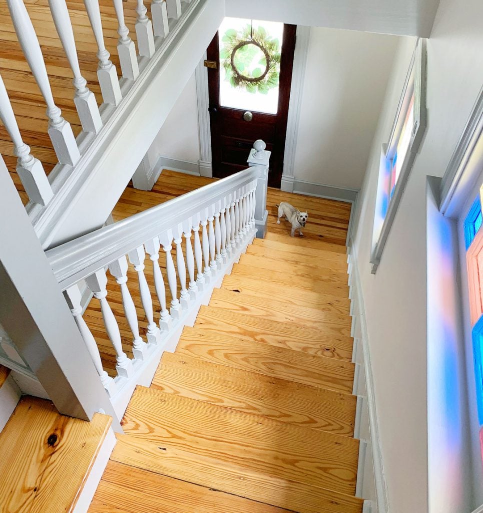 burger-bottom-of-beach-stairs-965x1024-1 Overhead view of bare wood historic stairs in beach house