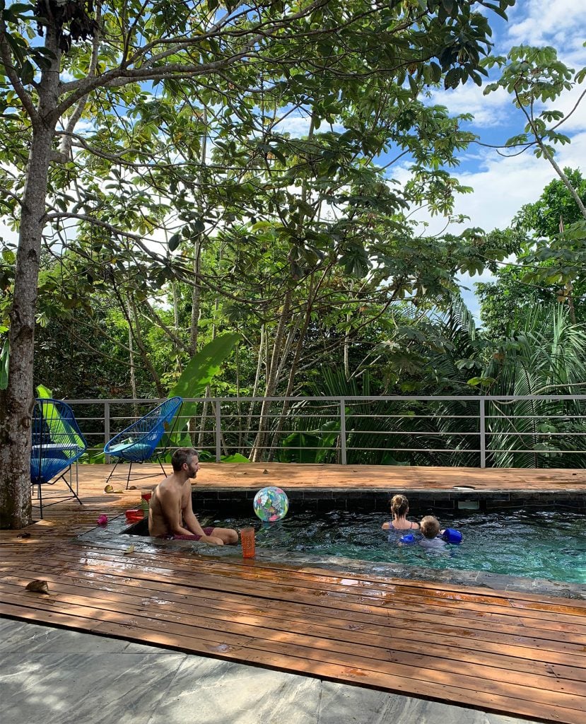 costa-rica-vacation-first-airbnb-pool-829x1024-1 Dad Playing With Kids At Pool In Costa Rica Jungle
