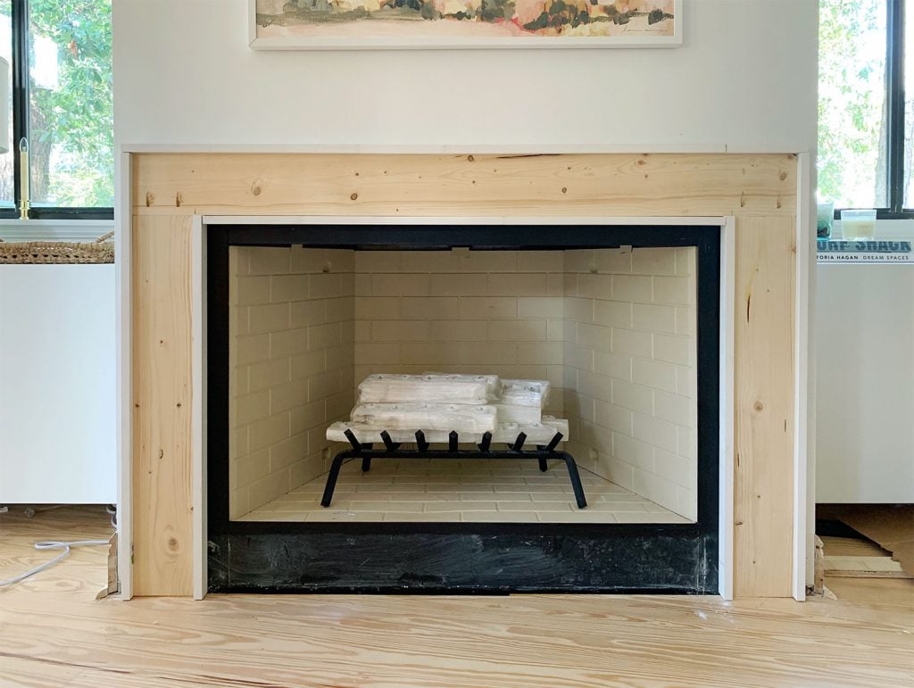 diy-fireplace-mantel-hidden-support-trim-added-1024x771-1 Completed Mantel Brace Piece With Border Of White 1x2 Wood