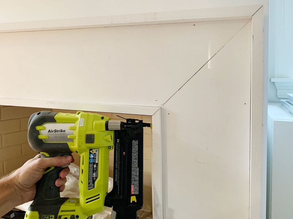 diy-fireplace-mantel-nailing-inner-pieces-1024x768-1 Nail Gun Securing Inner Border Pieces Around Inside Of Mantel