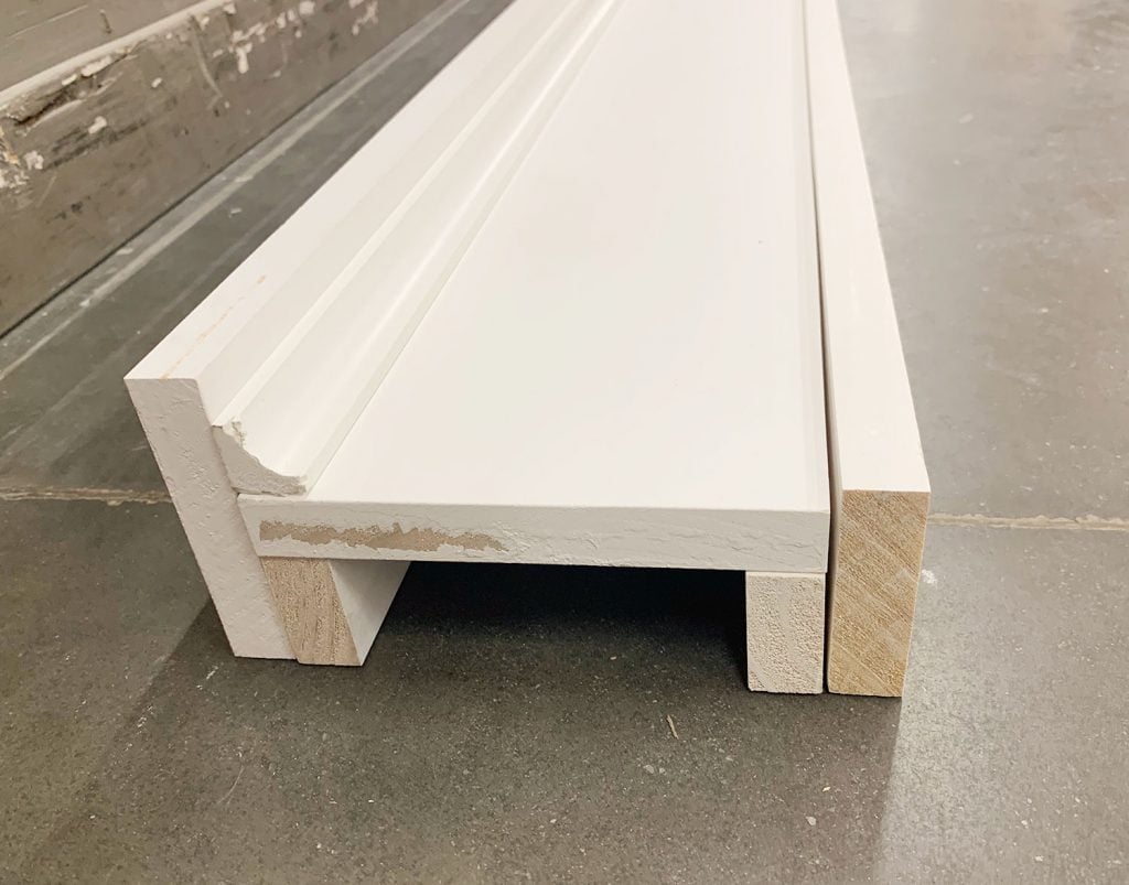 diy-fireplace-mantel-wood-on-store-floor-1024x803-1 Piece of White Wood Stacked On Floor In Fireplace Mock Up