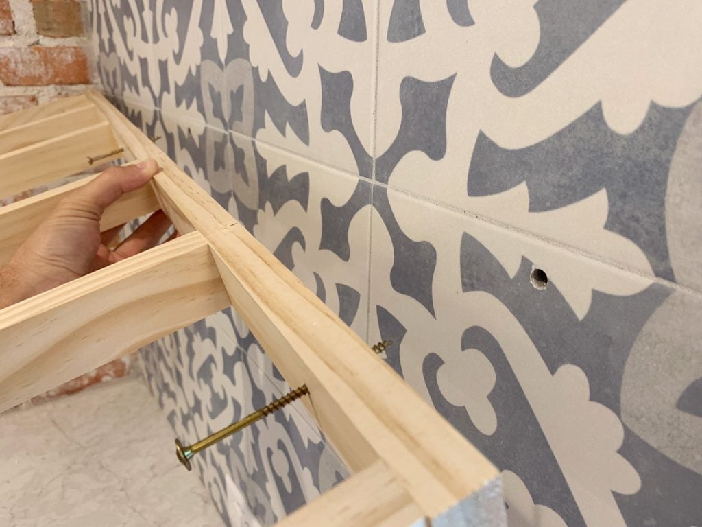 duplex-kitchen-shelves-screws-into-tile-holes-1024x768-1 Wooden Support Bracket For Floating Shelves Being Added To Kitchen Backsplash