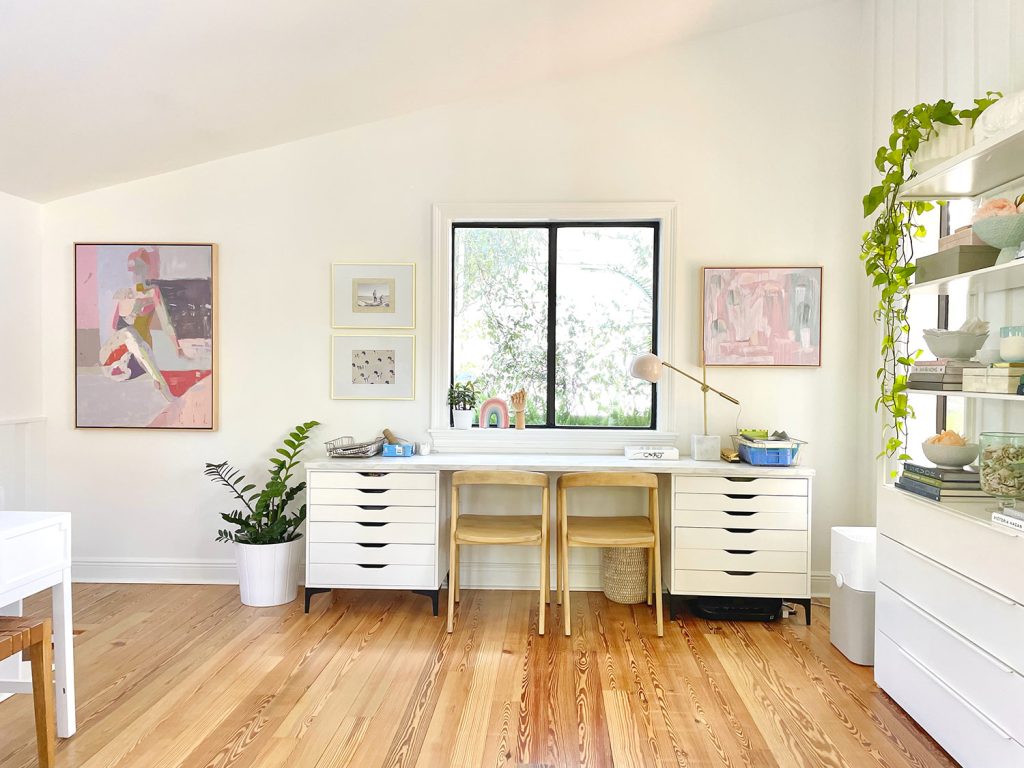 family-room-kids-desk-wall-wide-1024x768-1 Kids Art Desk Under Window In Open Modern White Family Room With Faulted Ceilings And Artwork