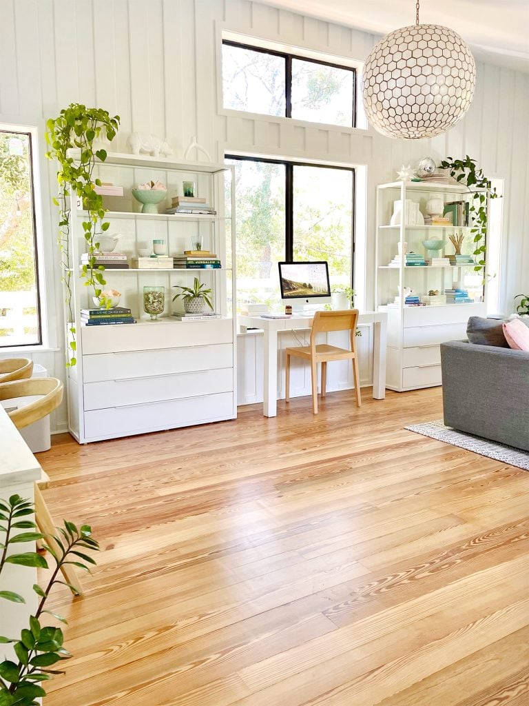 family-room-vertical-across-room-at-desk-768x1024-1 Two Ikea Fjalkinge Bookcases Flanking Office Deck In Middle Of Modern White Upstairs Family Room With Large Windows