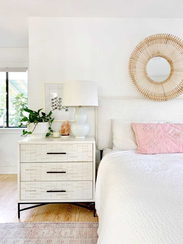 fireplace-headboard-left-side-768x1024-1 Linen headboard on bed with white bedding and inlay dresser as nightstand