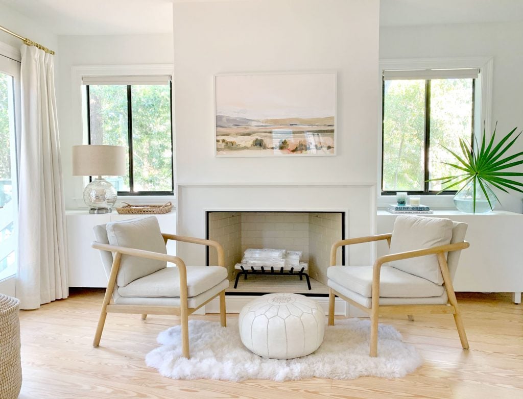 fireplace-wide-with-furniture-1024x782-1 Finished fireplace scene without Christmas decor just chairs and sheepskin rug