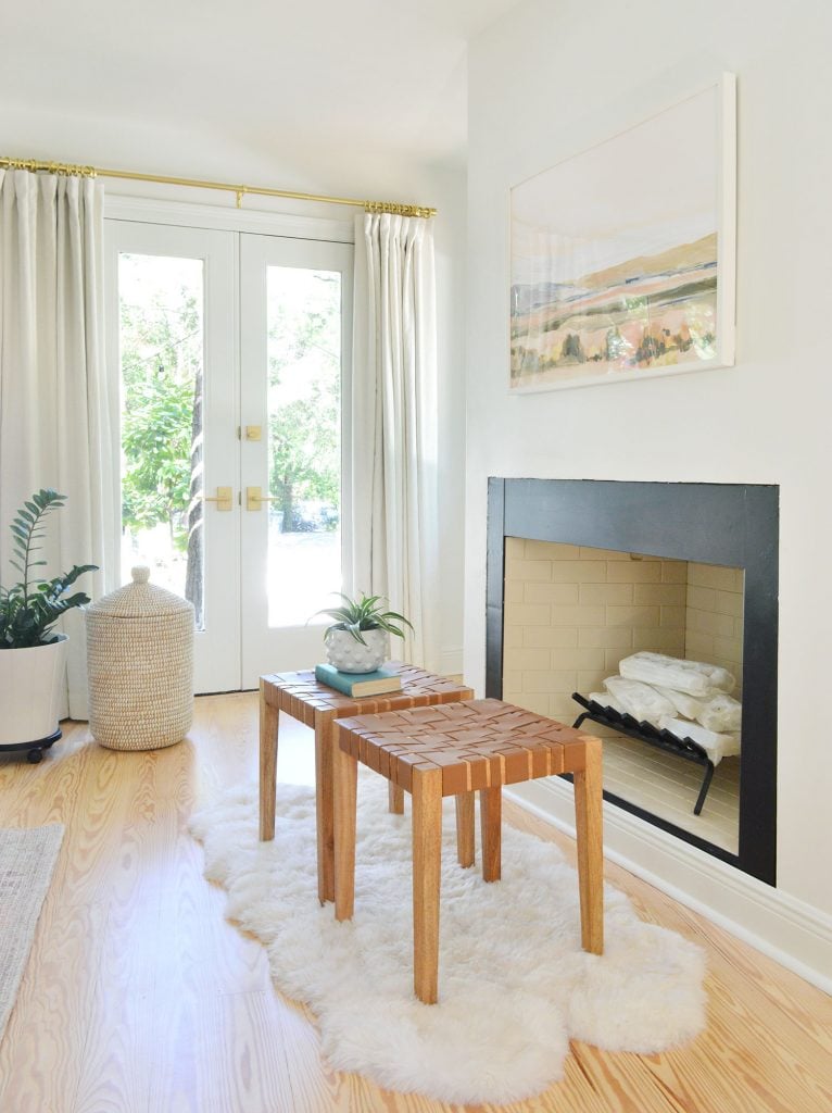 florida-bedroom-fireplace-angle-766x1024-1 Bedroom fireplace with white crystal logs stacked like firewood and candles unlit