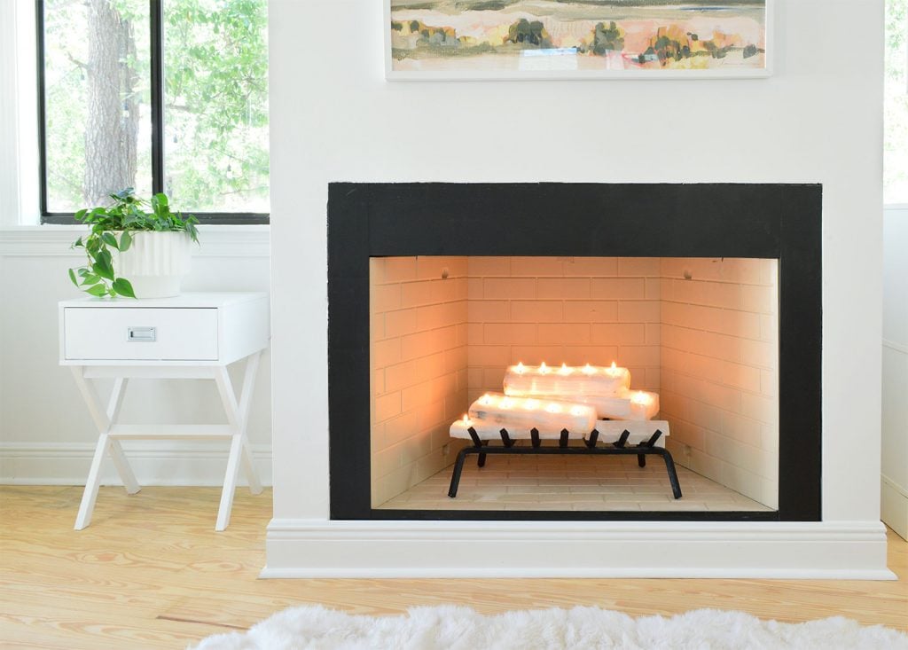 florida-bedroom-fireplace-straight-lit-1024x733-1 Straight shot of fireplace with crystal logs lit
