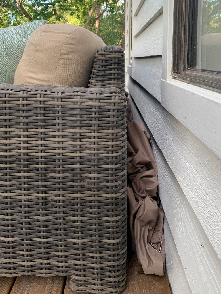 florida-deck-cover-behind-couch-768x1024-1 Sun Sail Cover Stuffed Behind Outdoor Sofa