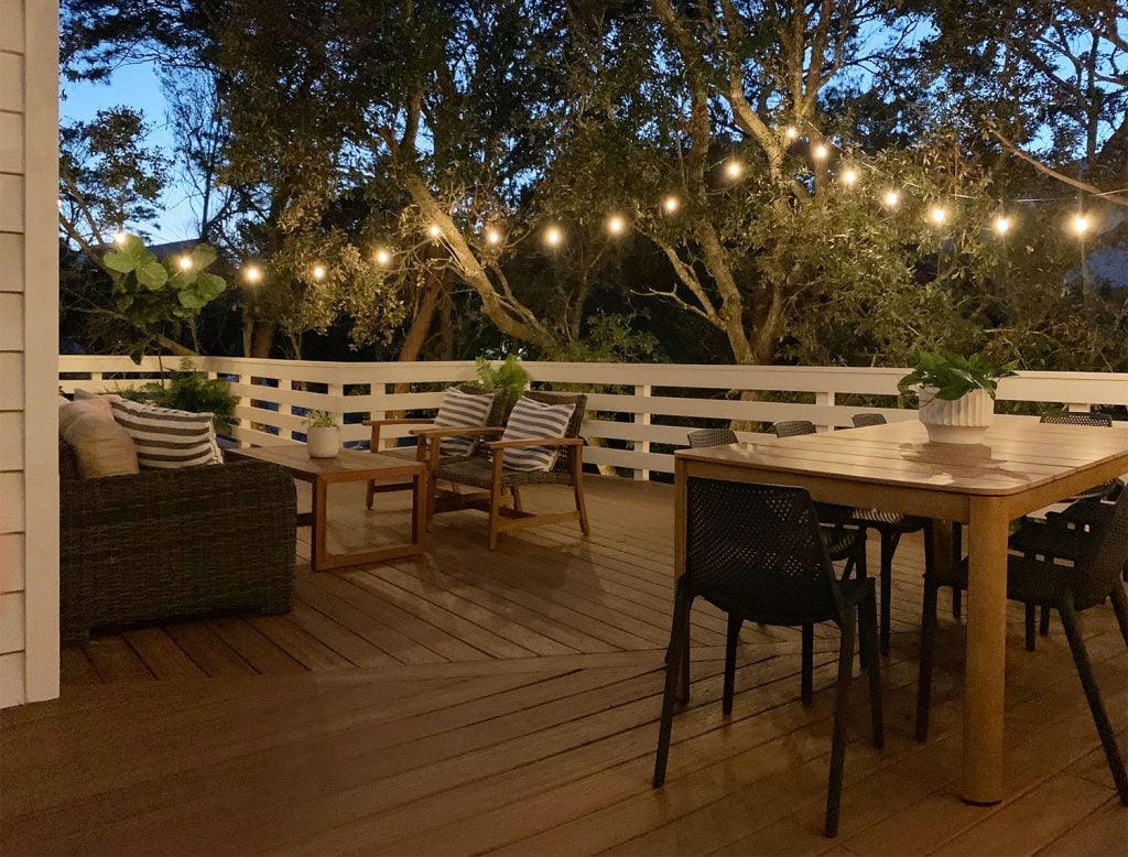 florida-deck-dining-wide-night-1024x778-1 Nighttime View Of Large Deck With String Lights
