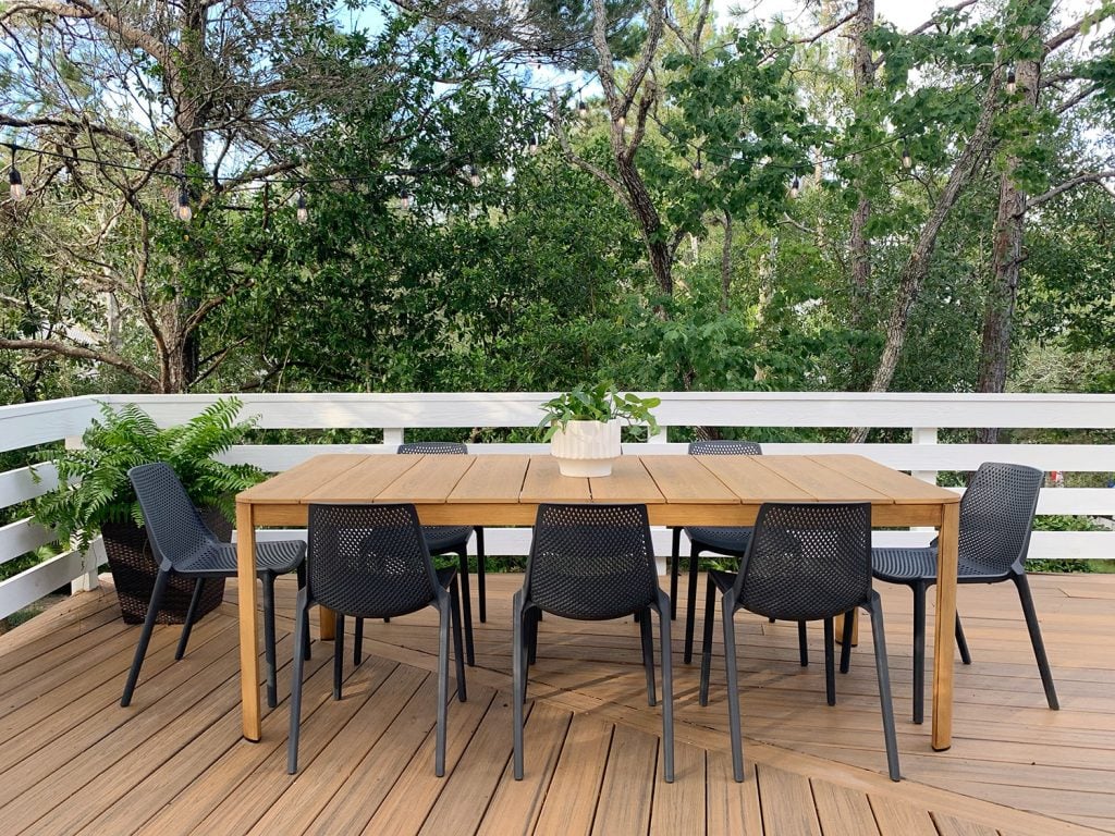 florida-deck-outdoor-table-straight-1024x768-1 Metal Outdoor Dining Table With Eight Black Plastic Chairs