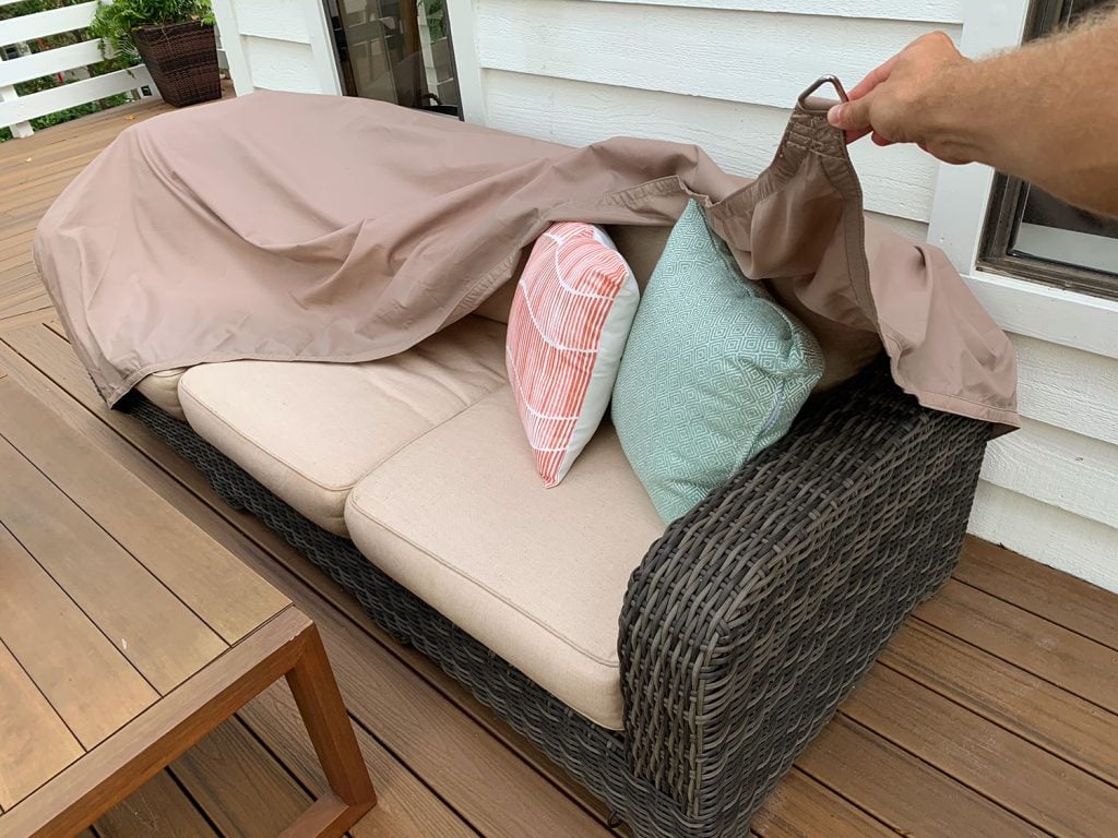 florida-deck-pulling-sail-shade-cover-1024x768-1 Waterproof Sail Shade Cover Being Pulled Over Outdoor Couch