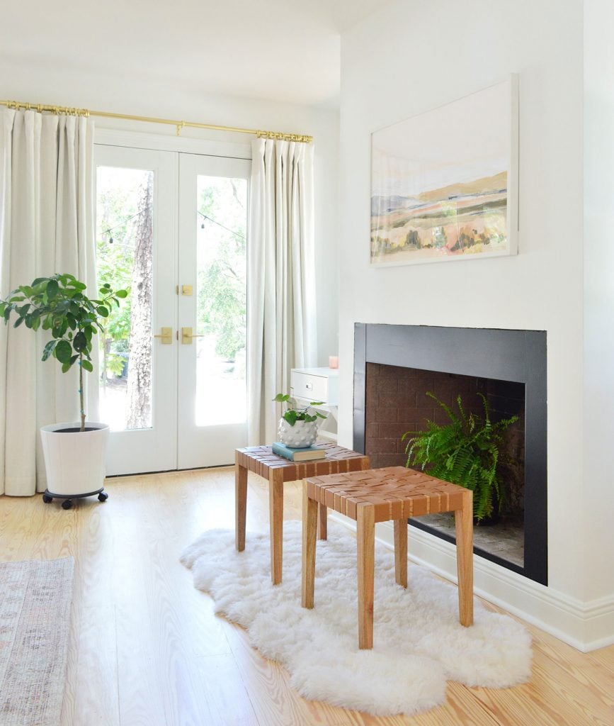 florida-fireplace-painted-black-full-867x1024-1 Bedroom fireplace with black border and fern in firebox