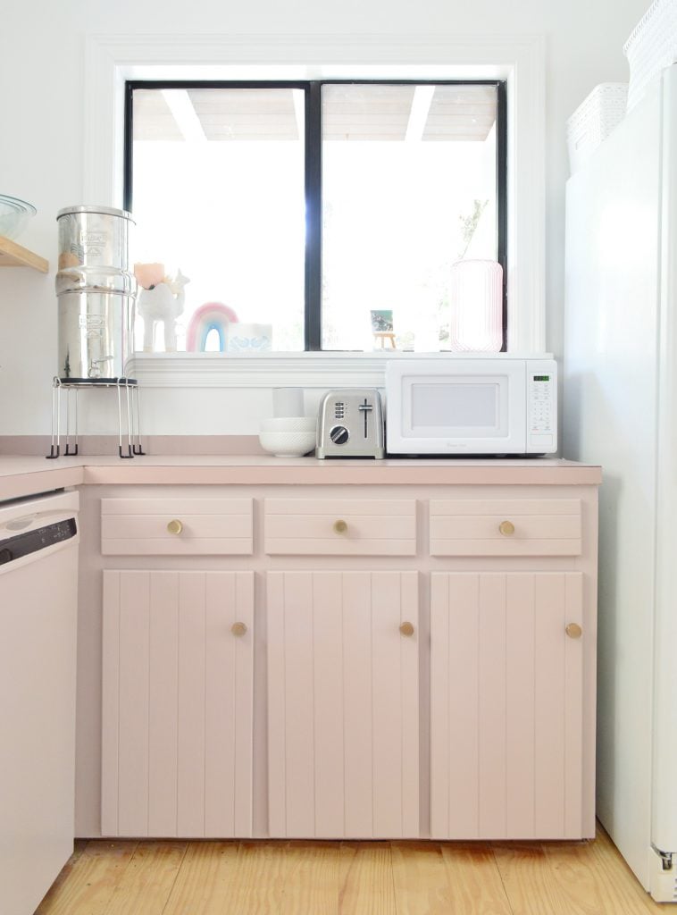 florida-kitchen-painted-cabinets-microwave-758x1024-1 Kitchen with mauve cabinets and window above counter