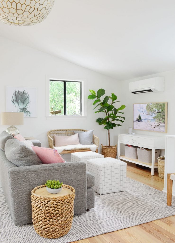 florida-living-room-seating-area-to-tv-739x1024-2 TV Area With Couch Striped Ottomans And Woven Bench